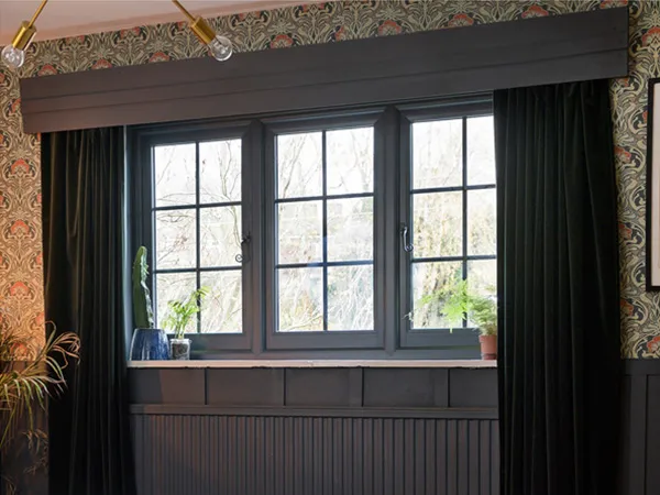 Windows with bars and monkey tail handles